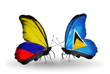 Two butterflies with flags Columbia and Saint Lucia