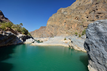 Natural pool between the mountains in Oman