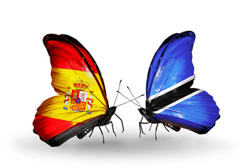 Two butterflies with flags Spain and Botswana