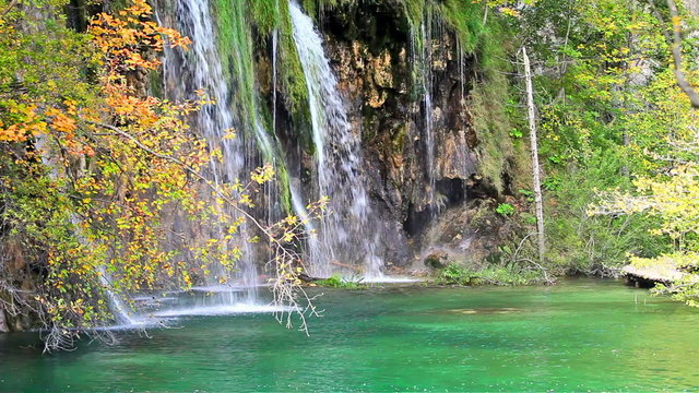 Waterfall and Small Lake in Autumn