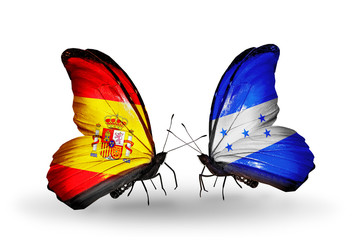 Two butterflies with flags Spain and Honduras