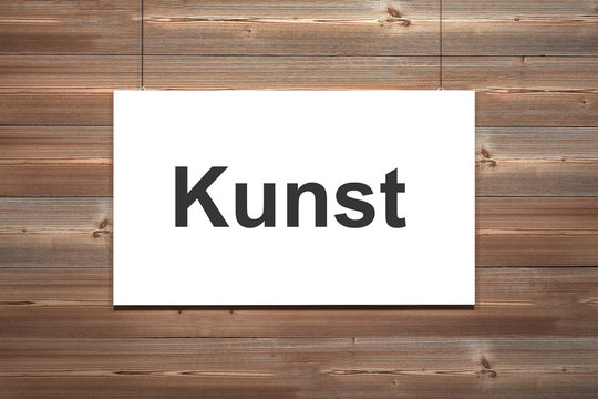 Wei&szlig;e Leinwand vor brauner Holzwand Kunst