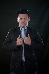 young business man sigh two like icon by hand