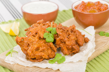 Onion Bhajis - Asian fritters with lime chutney and mint raita.