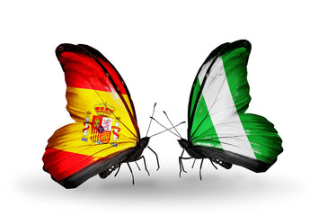 Two butterflies with flags Spain and Nigeria
