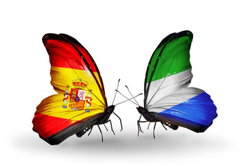 Two butterflies with flags Spain and Sierra Leone