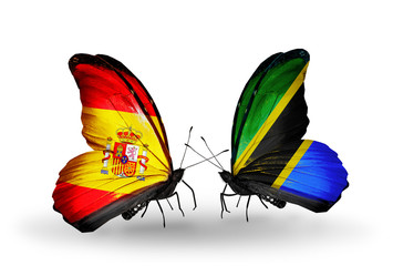 Two butterflies with flags Spain and Tanzania