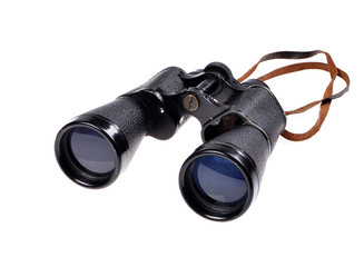 Old vintage binoculars on a white background .