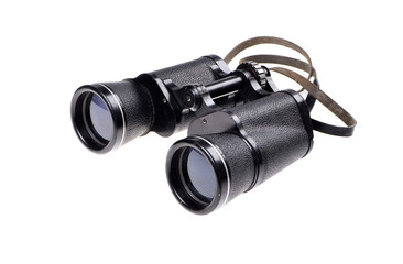 Old vintage binoculars on a white background .