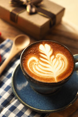 vintage color tone of  cup of coffee  on the table coffee shop