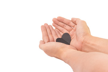 Valentines Day Black Heart paper on Hand with White Isolated Bac