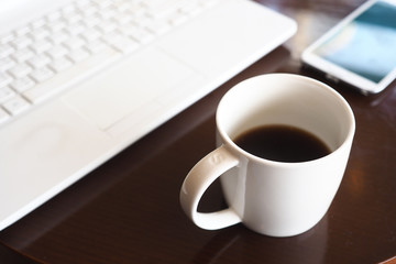 vintage color tone of  cup of coffee  on the table coffee shop