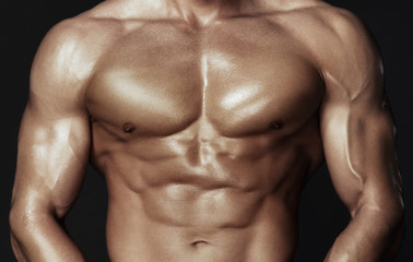 Fototapeta na wymiar Body of muscular man