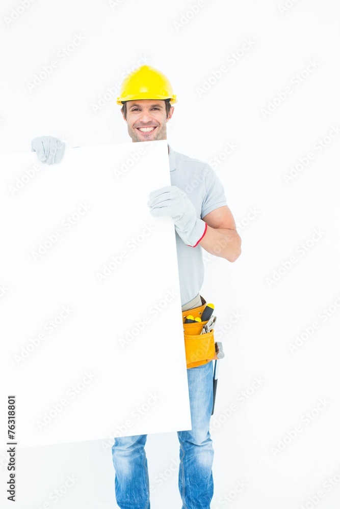 Poster handsome architect with bill board over white background