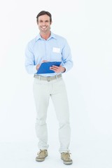 Confident businessman holding clipboard