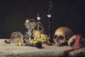 Vanitas with Skull; Pipe, tobacco, wine glass, wine and grape