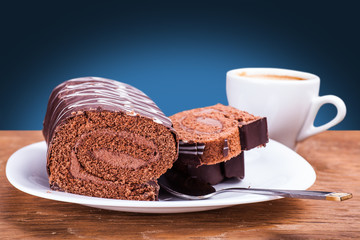 plate with chocolate dessert and a cup of coffee