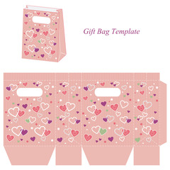 Pink gift bag with colorful hearts