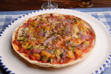 Pizza with pumpkin and bacon