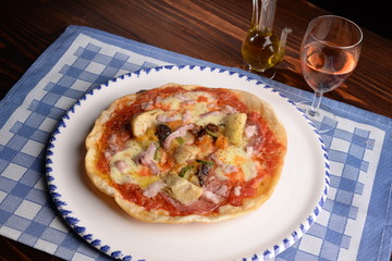 Pizza with artichokes and bacon