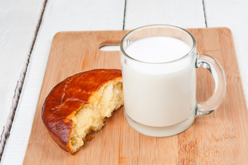Bun and cup of milk