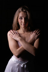 Fototapeta premium Low key girl in ballet dress posing