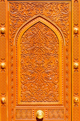 Wooden carvings on the door of a Mosque, Muscat, Oman
