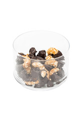 Cookies halfway into chocolate and half nuts