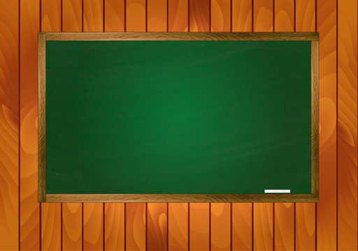 School blackboard on wooden background