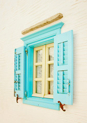 blue window in Chora the capital of Amorgos island in Greece
