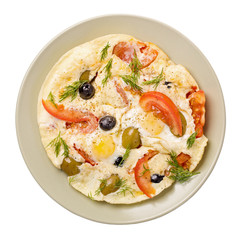 Scrambled eggs with tomatoes and olives isolated