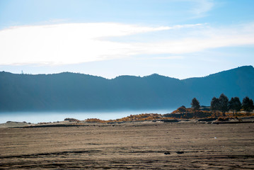 Early morning mist at mount Bromo plateau, Indonesia