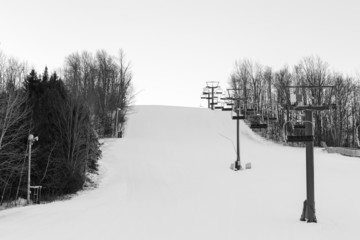Chair lift and run at a ski resort
