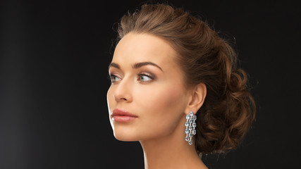 woman with diamond earrings