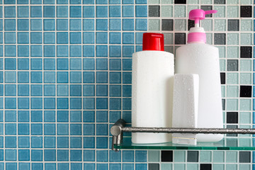 Group of shampoo bottles in a bathroom