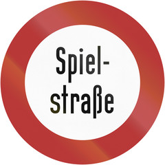 Old design (1956) of a German play street sign. It says: Play street