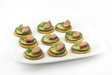 Crackers with Cucumber Sausage and Parsley