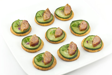 Crackers with Cucumber Sausage and Parsley