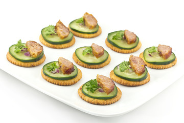 Crackers with Cucumber Sausage and Parsley