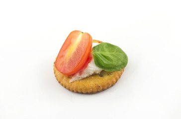 Crackers with Cheese Tomato and Basil