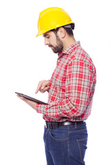 Young architect holding a tablet computer, isolated on white bac
