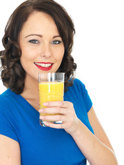 Healthy Young Woman Drinking Orange Juice
