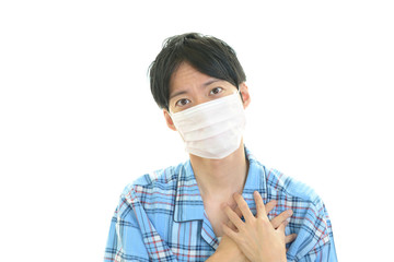 風邪に罹患した男性