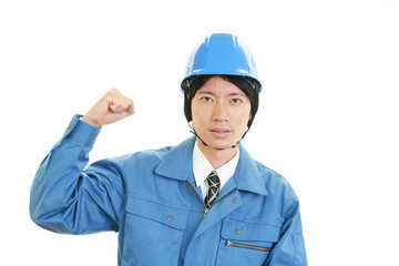 ガッツポーズの労働者