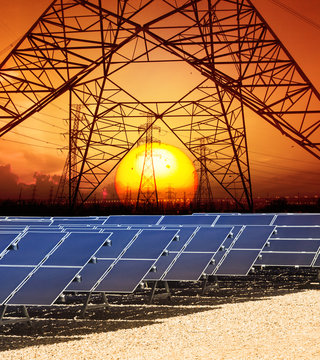 sun set with structure of high voltage electric power tower and