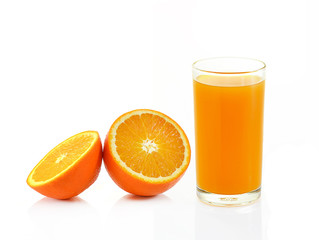 Fresh orange and glass with juice on white background