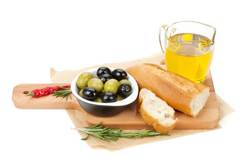 Italian food appetizer of olives, bread and spices