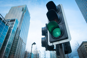 Green, Yellow and Red Traffic Light in the London city..