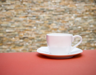 Cup of coffee on Sofa