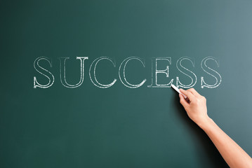 success written on blackboard